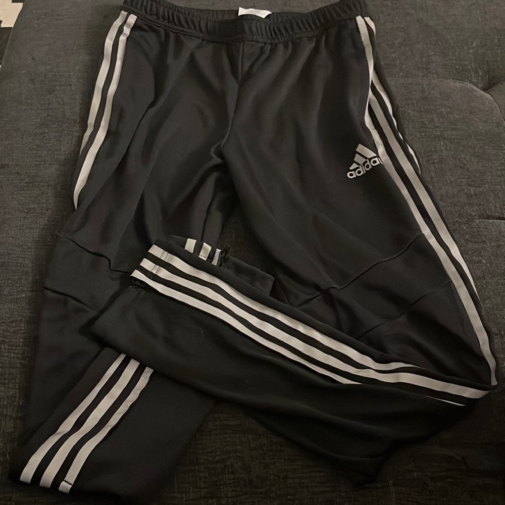 Black and silver adidas tiro pant